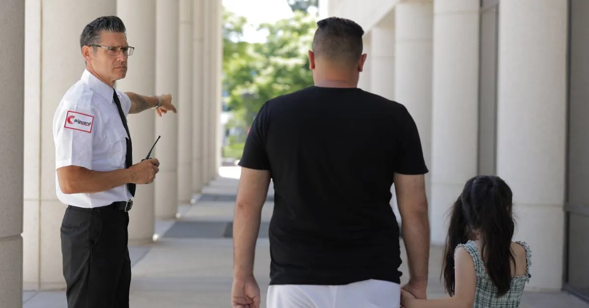 security guards giving directions to a person