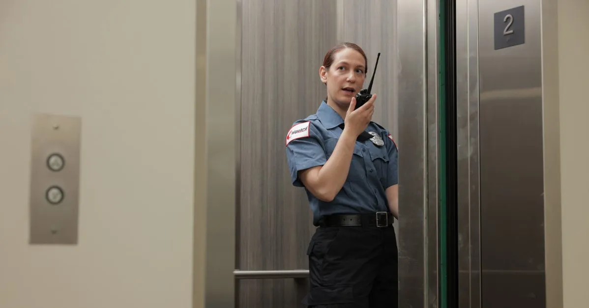 (private security guard in an elevator)
