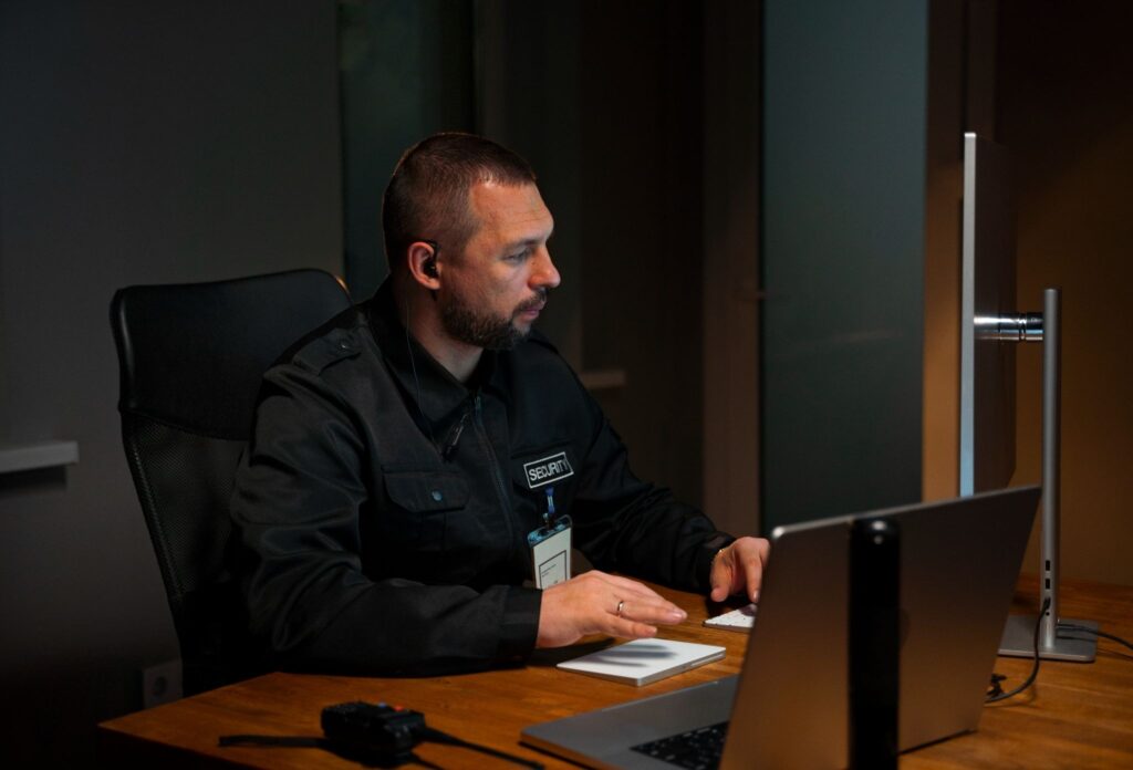 Security officers reviewing patrol procedures and incident reports